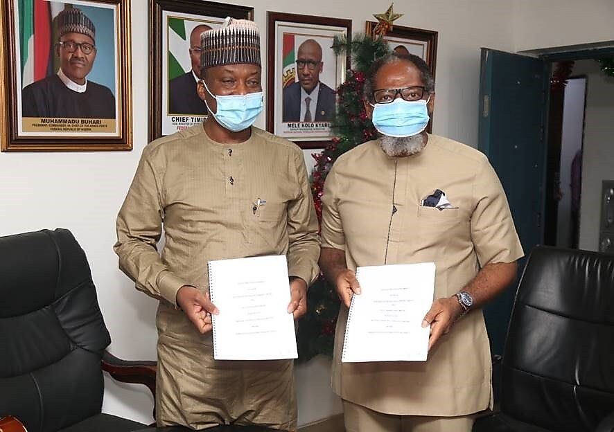 Managing Director, Shell Nigeria Gas, Ed Ubong (right) and the Managing Director, Nigerian Gas Marketing Company, Faruk Usman, after signing a 20-year Gas Distribution Agreement in Abuja.