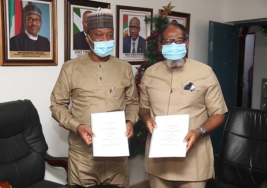 Managing Director, Shell Nigeria Gas, Ed Ubong (right) and the Managing Director, Nigerian Gas Marketing Company, Faruk Usman, after signing a 20-year Gas Distribution Agreement in Abuja.
