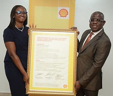 Managing Director, Shell Nigeria Exploration and Production Company Limited (SNEPCo), Mrs. Elohor Aiboni, receiving the Shell Safety, Environment and Social Performance Charter from her predecessor, Mr. Bayo Ojulari, in a handover ceremony at SNEPCo’s head office in Lagos.